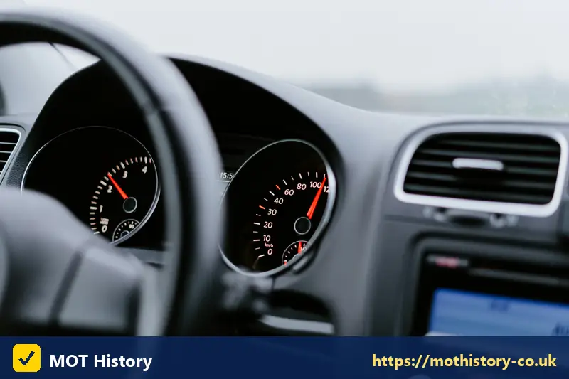 Car dashboard showing the speedometer and odometer - get vin from reg