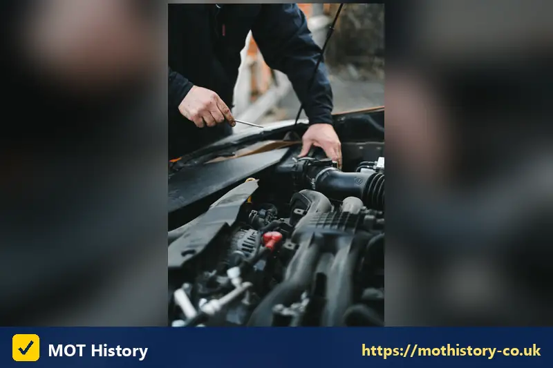 Hands tightening a part in an engine bay - why is my mot not showing online